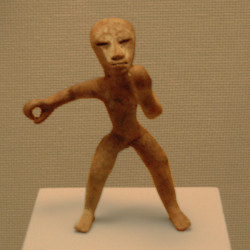 Classic period figurine of a man rowing