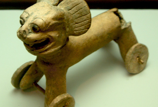 A toy jaguar on wheels