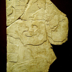 A Mayan Stele of a Lord offering a cocoa plant